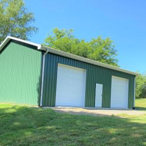32'x40' Metal Barn with 4 Overhead Doors