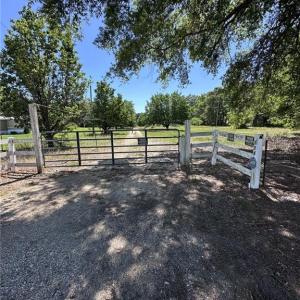 GATE AT ENTRANCE OF LAND