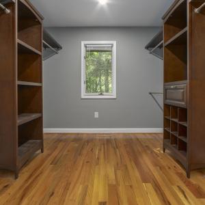 Primary Suite walk-in closet 1