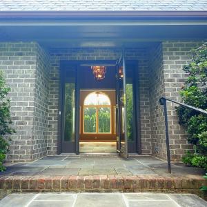 Recessed entry portico with sidelights