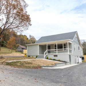 New landscaping and front sidewalk