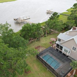 side view of home and dock and water