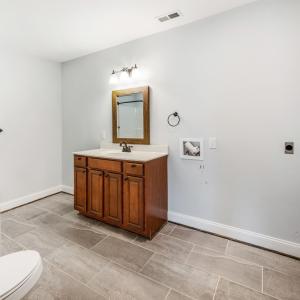 Basement bathroom with additional laundry option