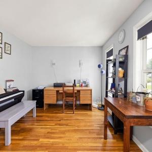 Just inside the front door is this cheery versatile room~ office? music room? sewing room? quiet den? formal living room?