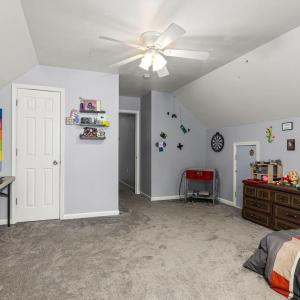 Bedroom 4 is a FROG (finished room over the garage) so it is quite spacious and has storage in the eaves