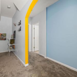 To the left is the storage/utility closet. The closet under the stairs is also spacious.