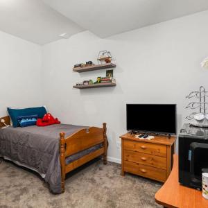 A cozy guest bedroom with mini frig, microwave and coffee machine!