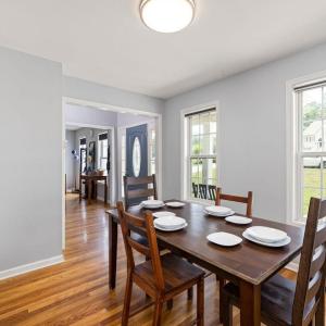 Separate DR on the other side of the center hall and also at the front of the house. Large bright sunny windows throughout.