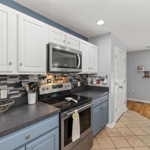 Microwave, electric stove, refrigerator and dishwasher all convey