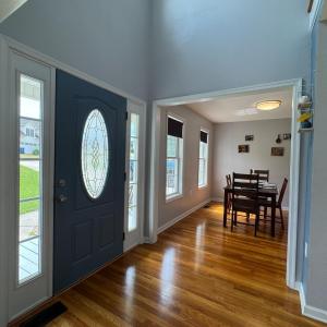Entering the front door; the Dining Room is on the Left; the hall is straight ahead.