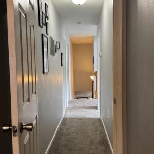 heading down the hallway for 2 more bedrooms