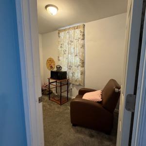 Entering the 5th bedroom which is located here off the den.