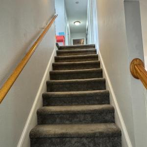Upstairs are 4 bedrooms and 2 full Baths.