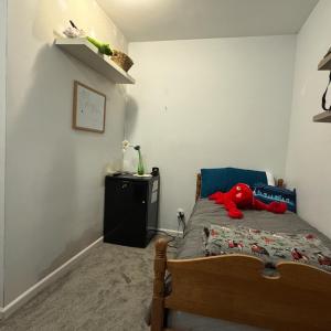 Pictured is a single bed but it could fit a full easily or a queen more snugly.
