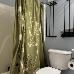 Full bathtub and towel racks for everyone