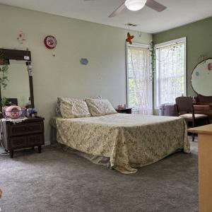 There is plenty of room for a King sized bed to fit here in several configurations with furniture.