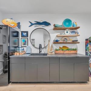 Wet bar and game room come fully equipped for immediate occupancy!