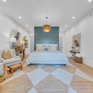 The primary ensuite offers a private oasis including a second laundry space!