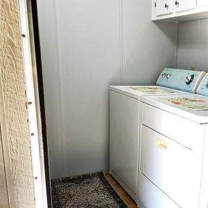 laundry area convenietly located inside the back door