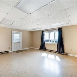 Home Office or Guest Room with Exterior Entrance adjacent to Rec Room