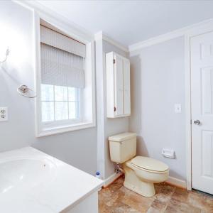 Lower Level Full Bath adjacent to potential 4th Bedroom