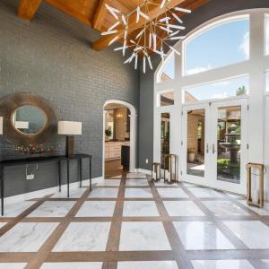 Marble & hardwood harlequin patterned floor