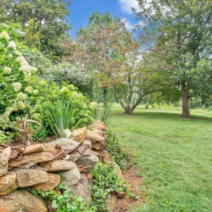 The perennial gardens create a paradise for birds and pollinators.