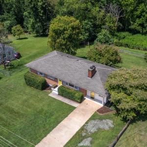 Aerial view of the front of the house and yard