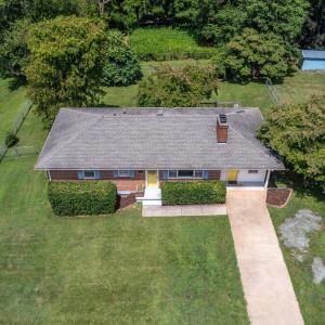 Aerial view of the front yard and house