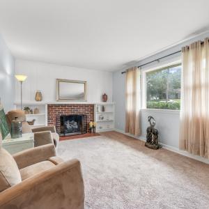 Living room with wood-burning fireplace