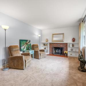 Living room with wood-burning fireplace