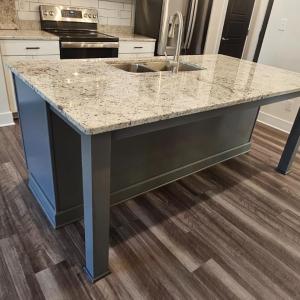 Kitchen island showing breakfast bar