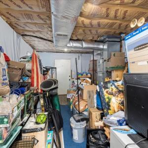 It looks full! But it is 15' of great storage space with an exterior door at the end which leads to the driveway!