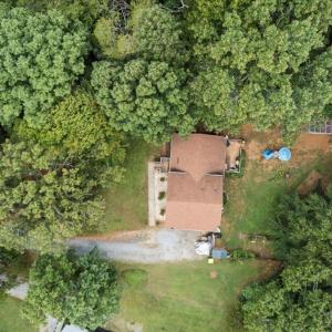 The house sits back on the lot off the street leaving plenty of yard to play in the front too. It is at the end of the cul-de-sac in this very nice neighborhood! The lot has a survey.