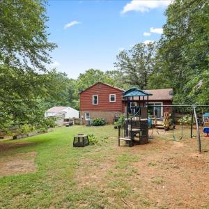 .6334 of an acre lot! Recently surveyed. Almost completely fenced. The chicken coop and enclosure do NOT convey