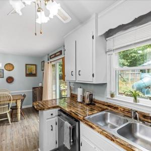 You get the 2 month old Kitchenaid stainless steel interior dishwasher!