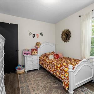 All the bedrooms and the 2 full baths are located on this level just up from the LR