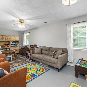 Above ground large bright den on the lower level