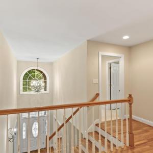 Looking towards second bedroom with private full bathroom