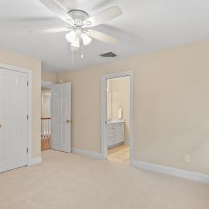 Bedroom #4 with walk-in attic access through closet
