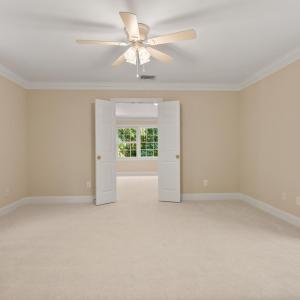 Sitting room looking back out to primary suite