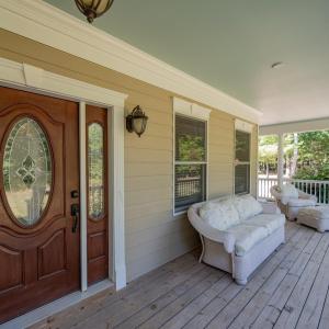 Front porch is L-Shaped and includes a side porch
