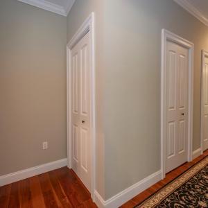 beddroom hallway, foyer & fiormal DR to right