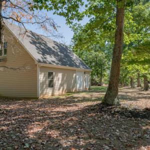 Rear of garage showing 3rd door