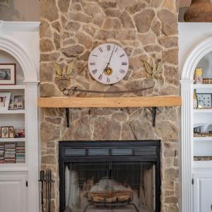 Rock woodburning FP in Greatroom