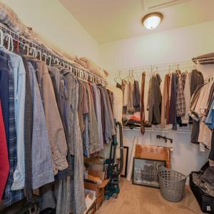 Walkin closet in primary bedroom