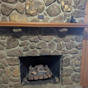 Remote for Gas FP on Right side of Mantel and Electrical outlet over Mantel