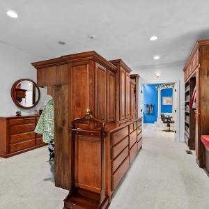 Master Dressing Room with attached laundry room and custom closets