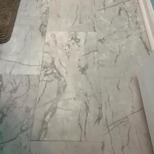 New vinyl plank flooring in bath.