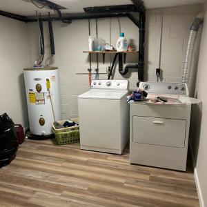 Utility room . Washer & Dryer convey.